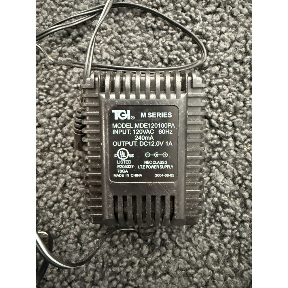 TGI M Series AC Adaptor MDE120100PA Input:120V 60Hz 240mA Output: DC 12.0V 1A